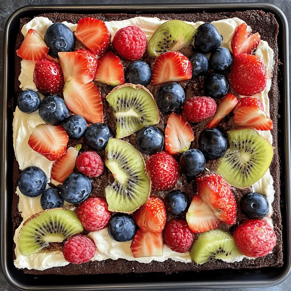 Treat yourself to a delightful twist on dessert with this Brownie Fruit Pizza! Featuring a rich brownie base topped with a creamy layer and vibrant fresh fruits, it's perfect for parties or a fun family night. This simple and delicious recipe is sure to impress everyone. Save this pin for your next gathering and enjoy a sweet slice of happiness!