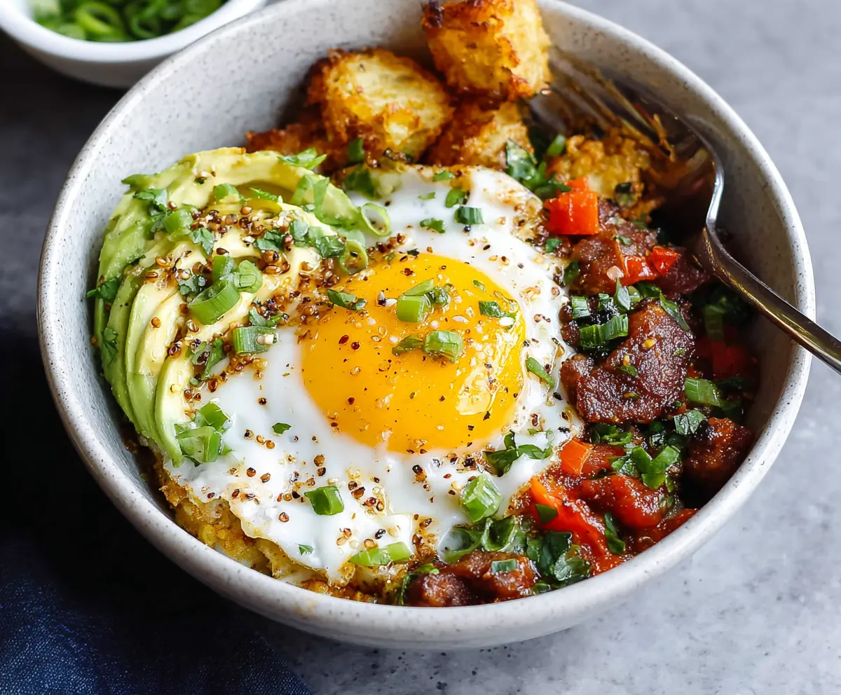 Delicious egg breakfast bowls with fresh vegetables and herbs for a healthy start to your day