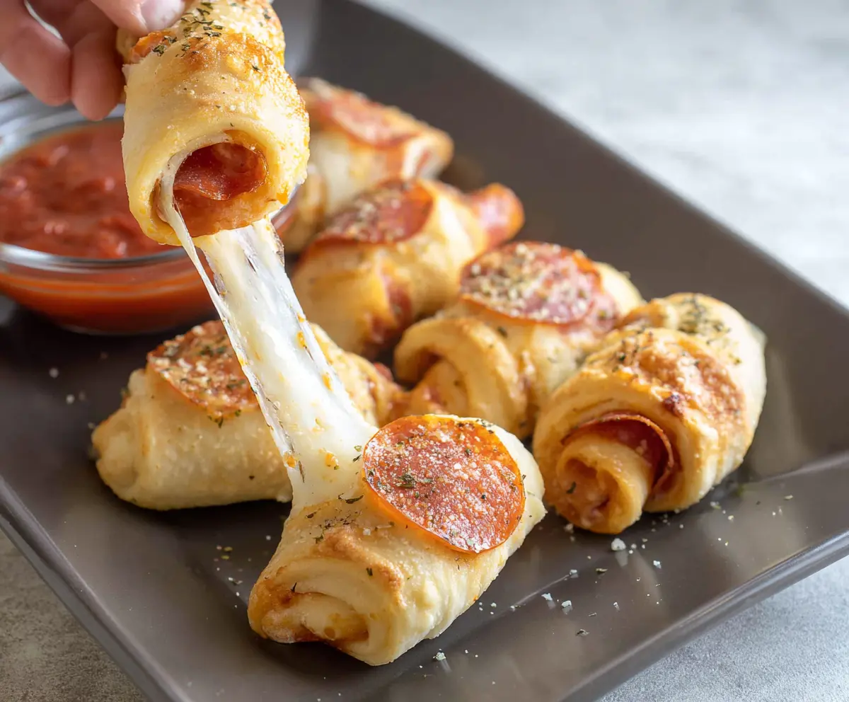 Delicious pepperoni and cheese roll ups perfect as a savory snack or appetizer.