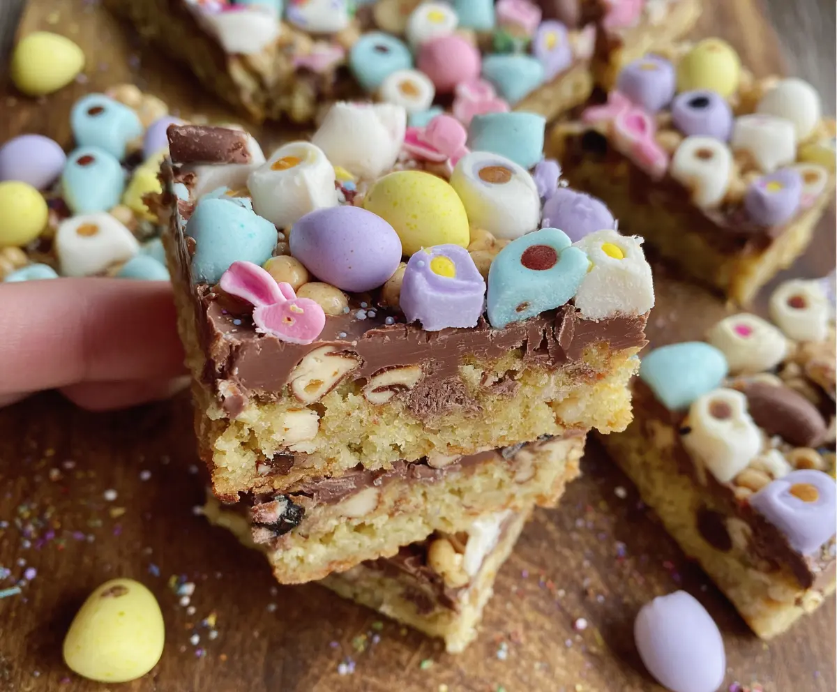 Delicious Easter Goody Bars with colorful candies and chocolate on a festive tray